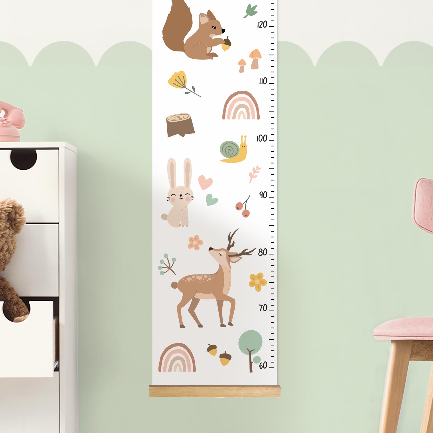 Height chart for children with Bambi, rainbow, and forest animals