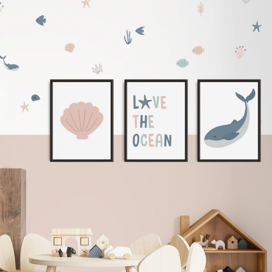 Decoración para habitación infantil con temática marina: una ballena, una almeja y una cita inspiradora