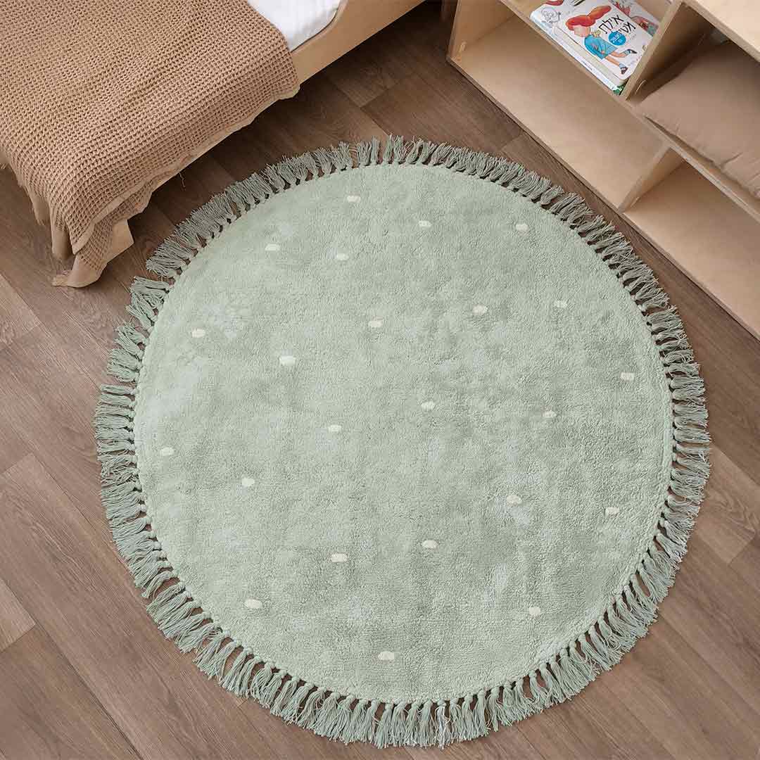 Round light green kids room rug LUCY with dots – 100% cotton machine washable by Ponponi