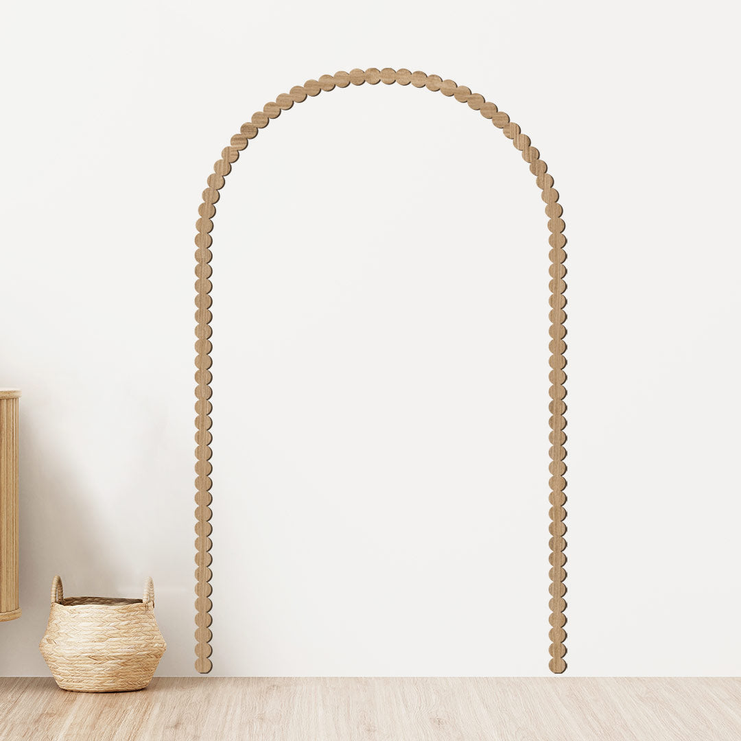 Wooden bow with rounded cornice and circles