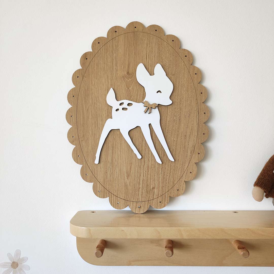 Wooden sign with decorative deer for wall decoration