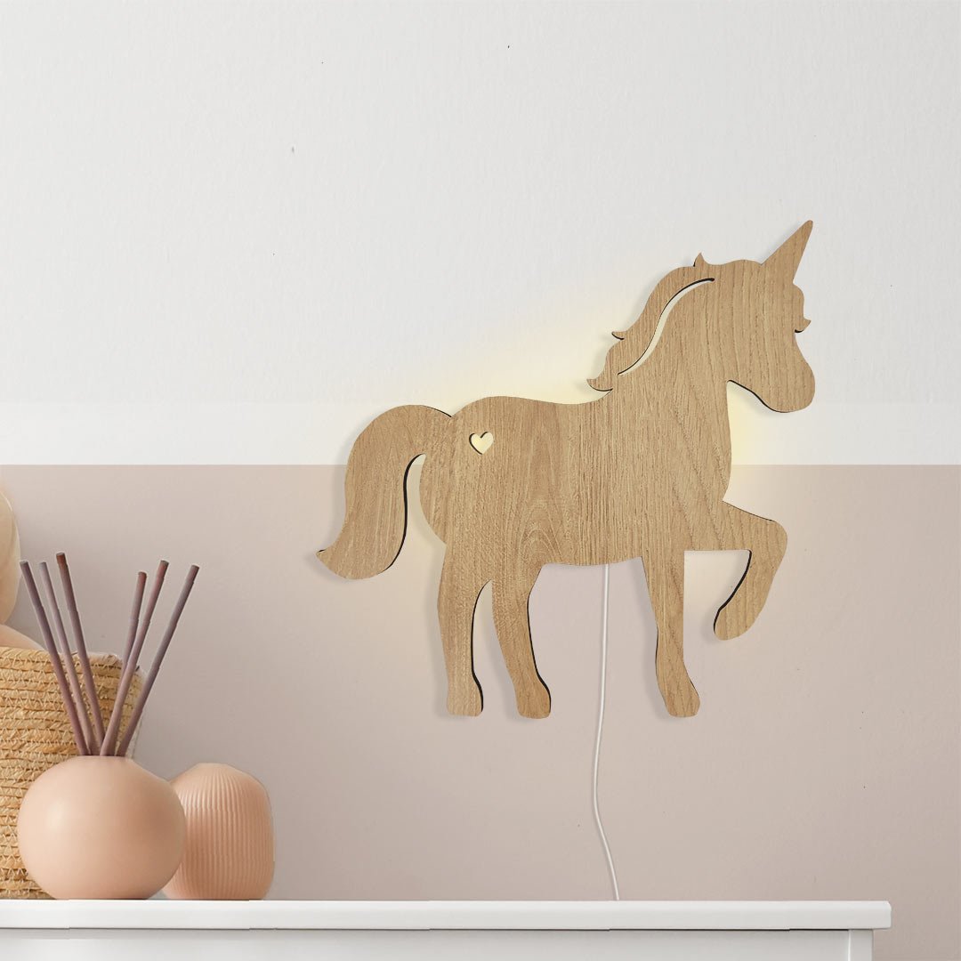 Luz de noche de unicornio de madera para niños.