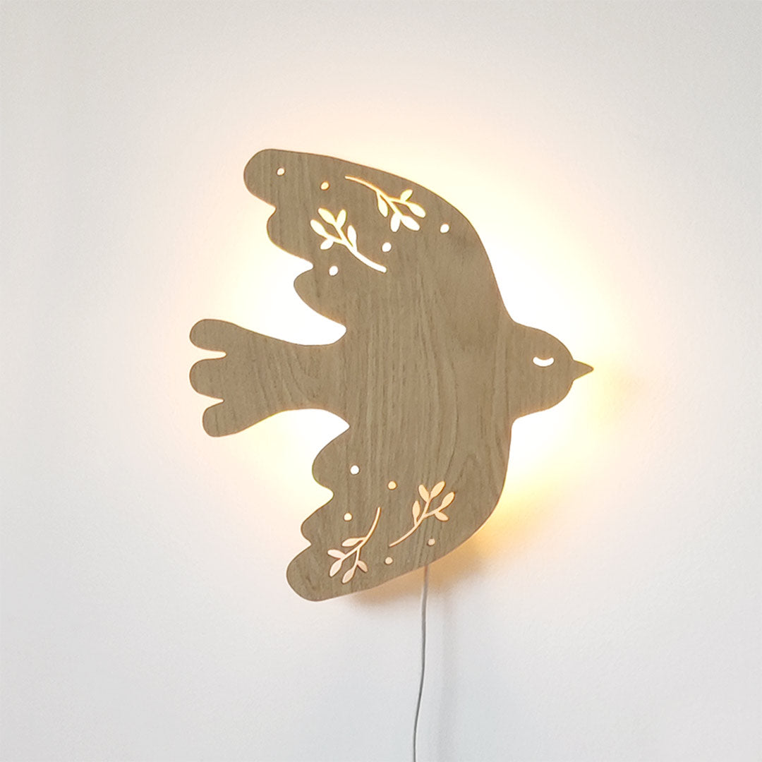 Luz nocturna de pájaro de madera