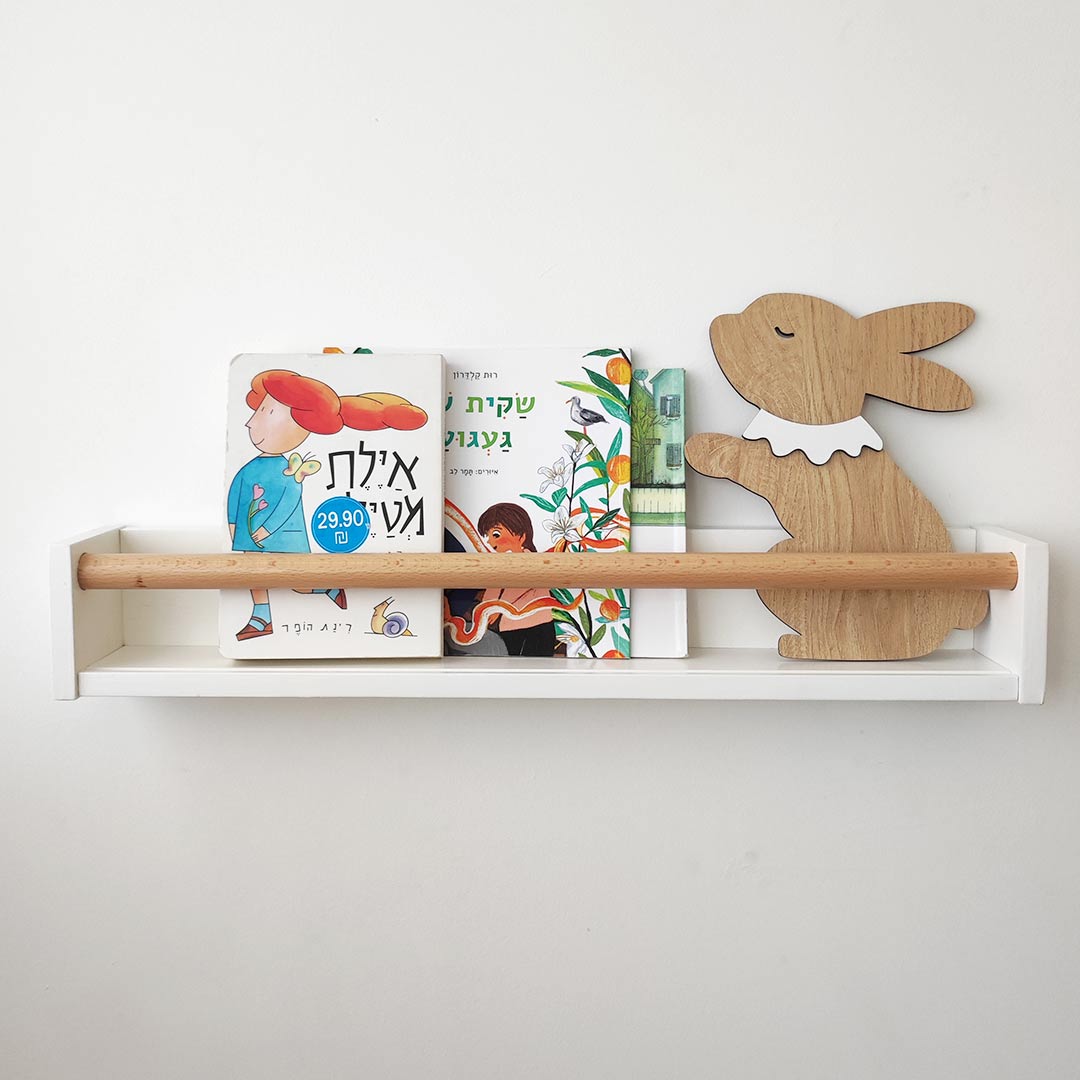 White bookshelf with wooden rod