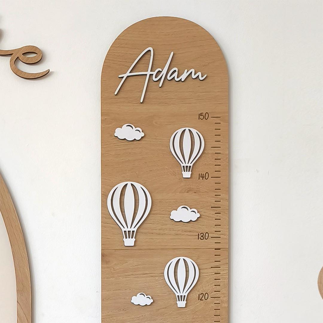 Wooden height chart for children with personalized name and balloons