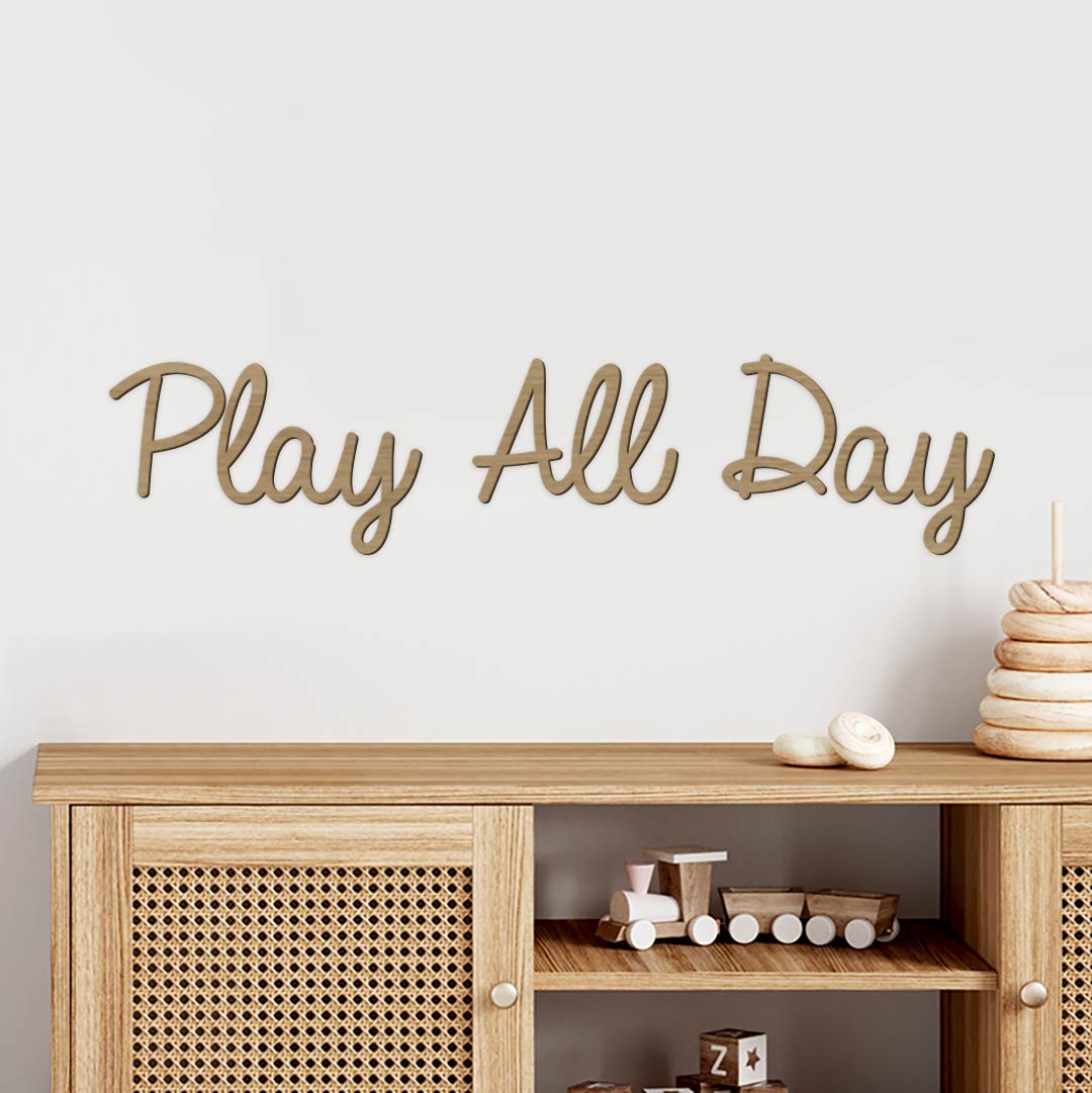 Inspirational quote from a wooden wall decoration – Play All Day