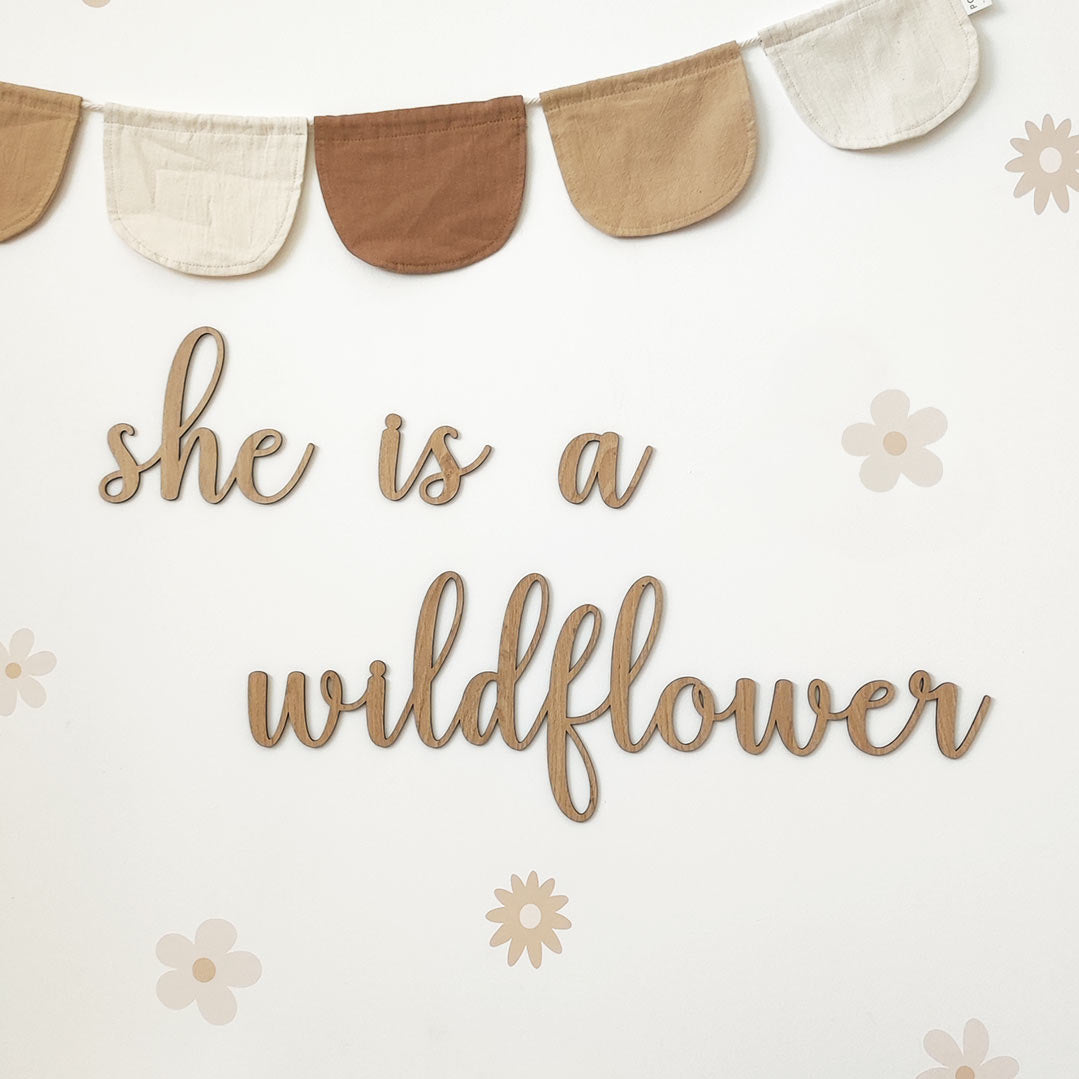 Wooden sign for a child's room – she is a wildflower